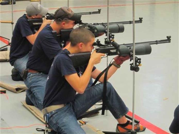 Cadets Participating in Air Rifle Marksmanship